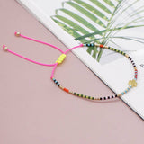 BOHEMIAN RAINBOW RICE BEADED CROSS Bracelet Pink/ Natural